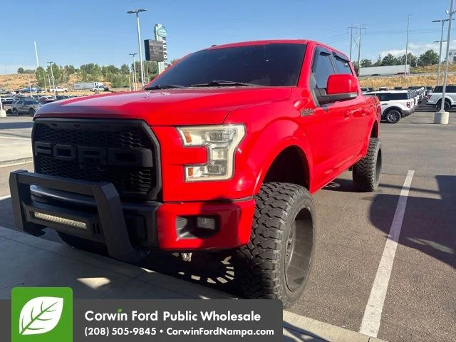 Used 2015 Red Ford Lariat image 1