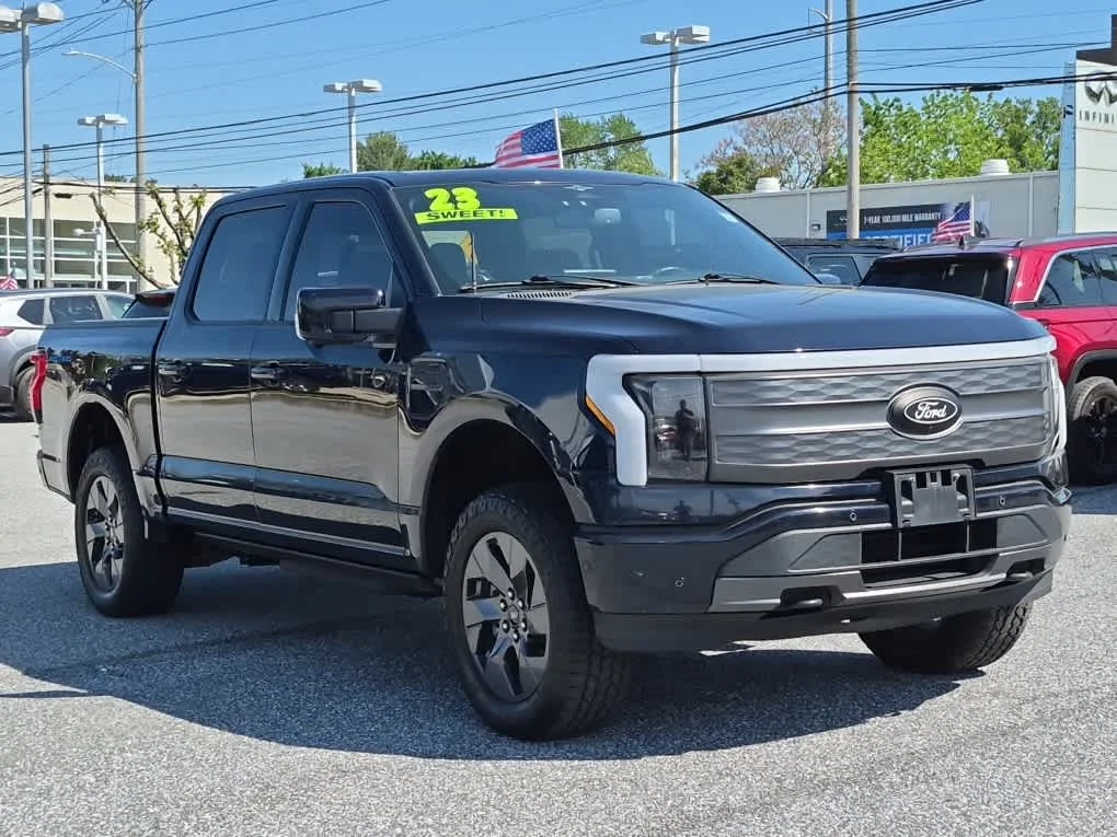 Used 2023 Ford F-150 Lightning Lariat with VIN 1FT6W1EV4PWG11496 for sale in Newark, DE