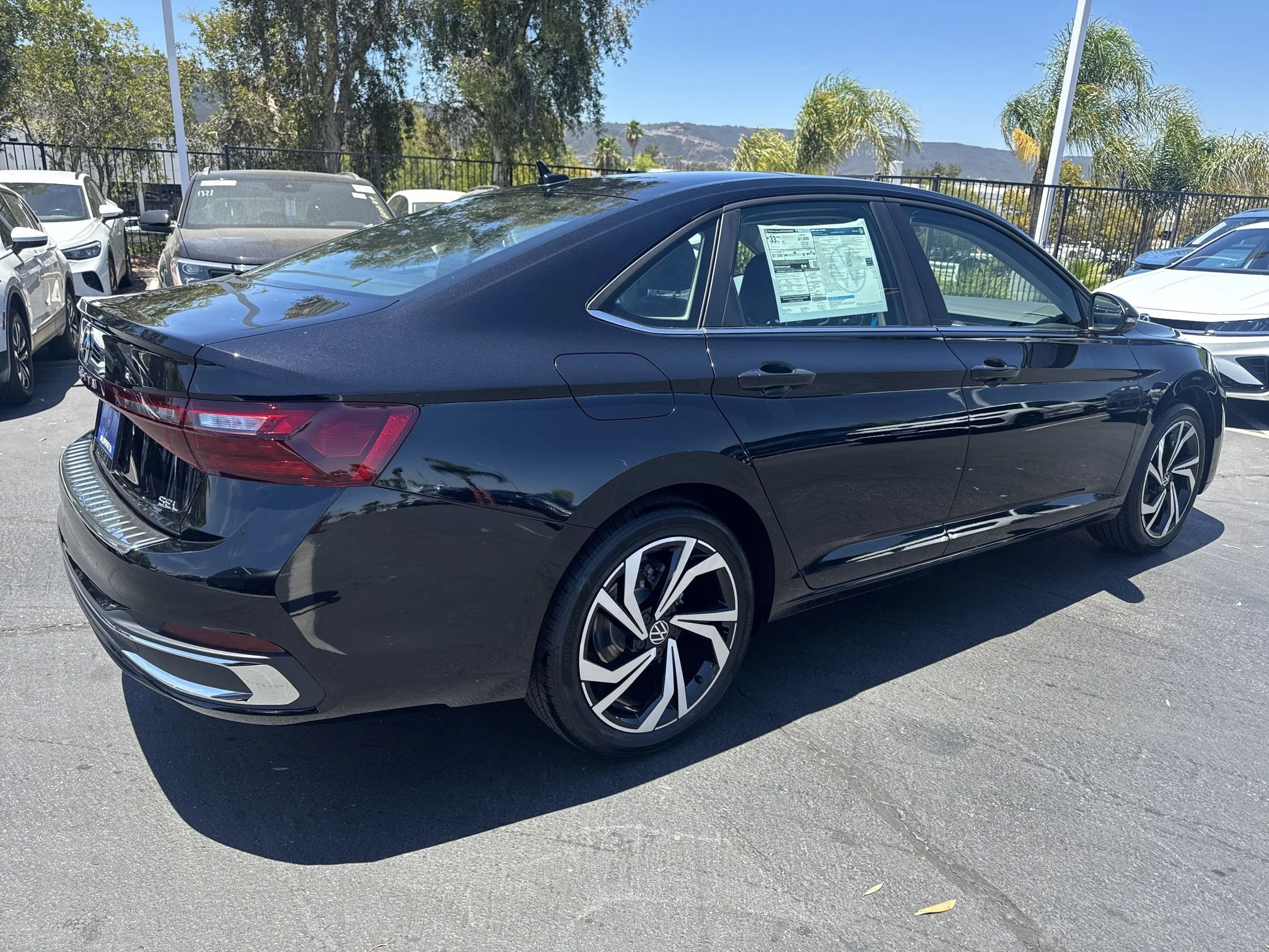 New 2026 Deep Black Pearl Volkswagen SEL image 7