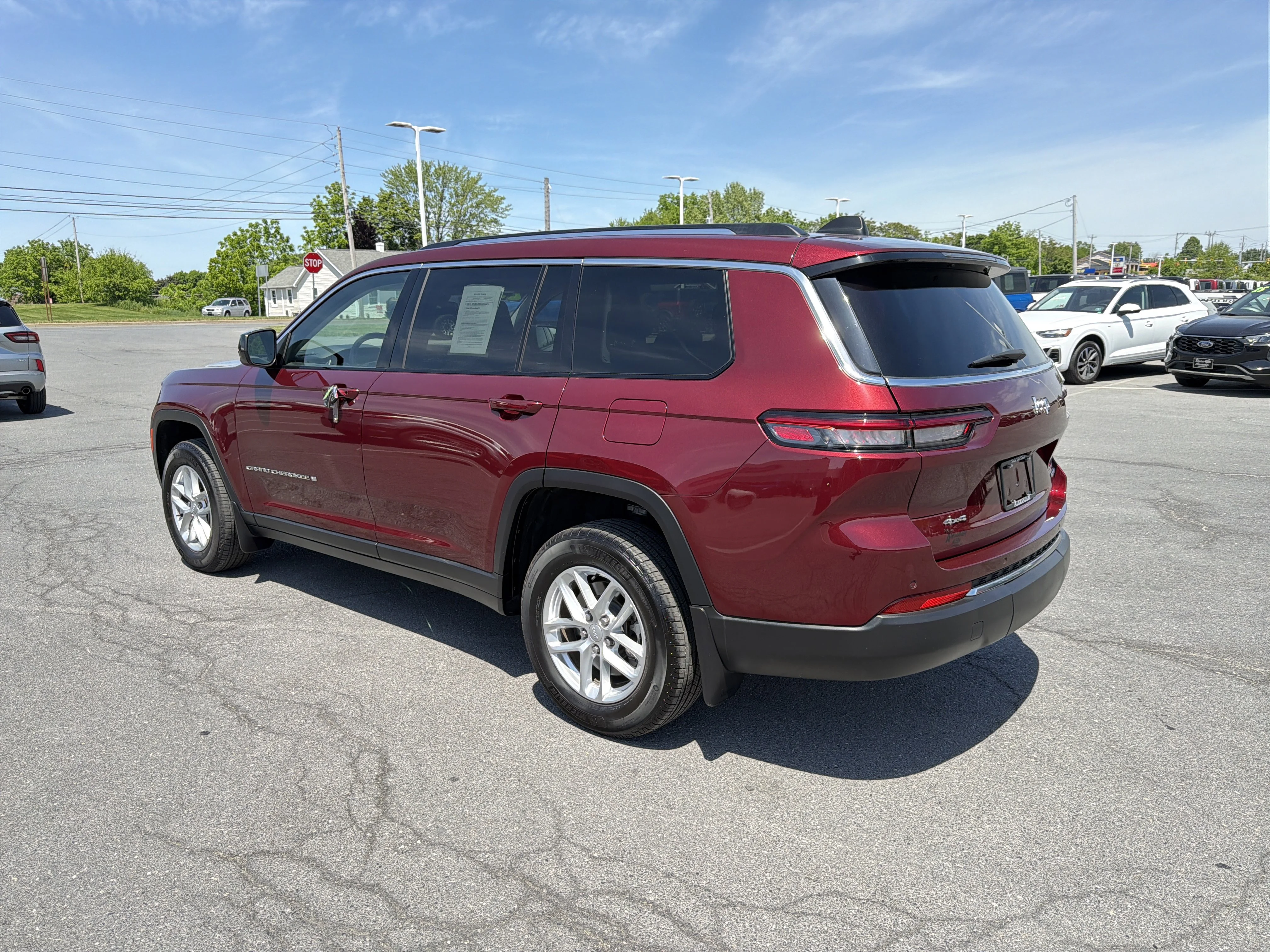 Used 2023 Velvet Red Pearlcoat Jeep Laredo image 6