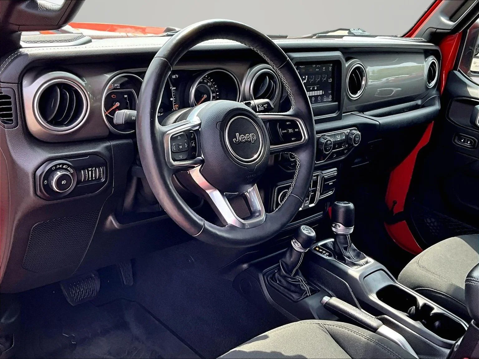 Used 2018 Orange Jeep Unlimited Sahara image 15