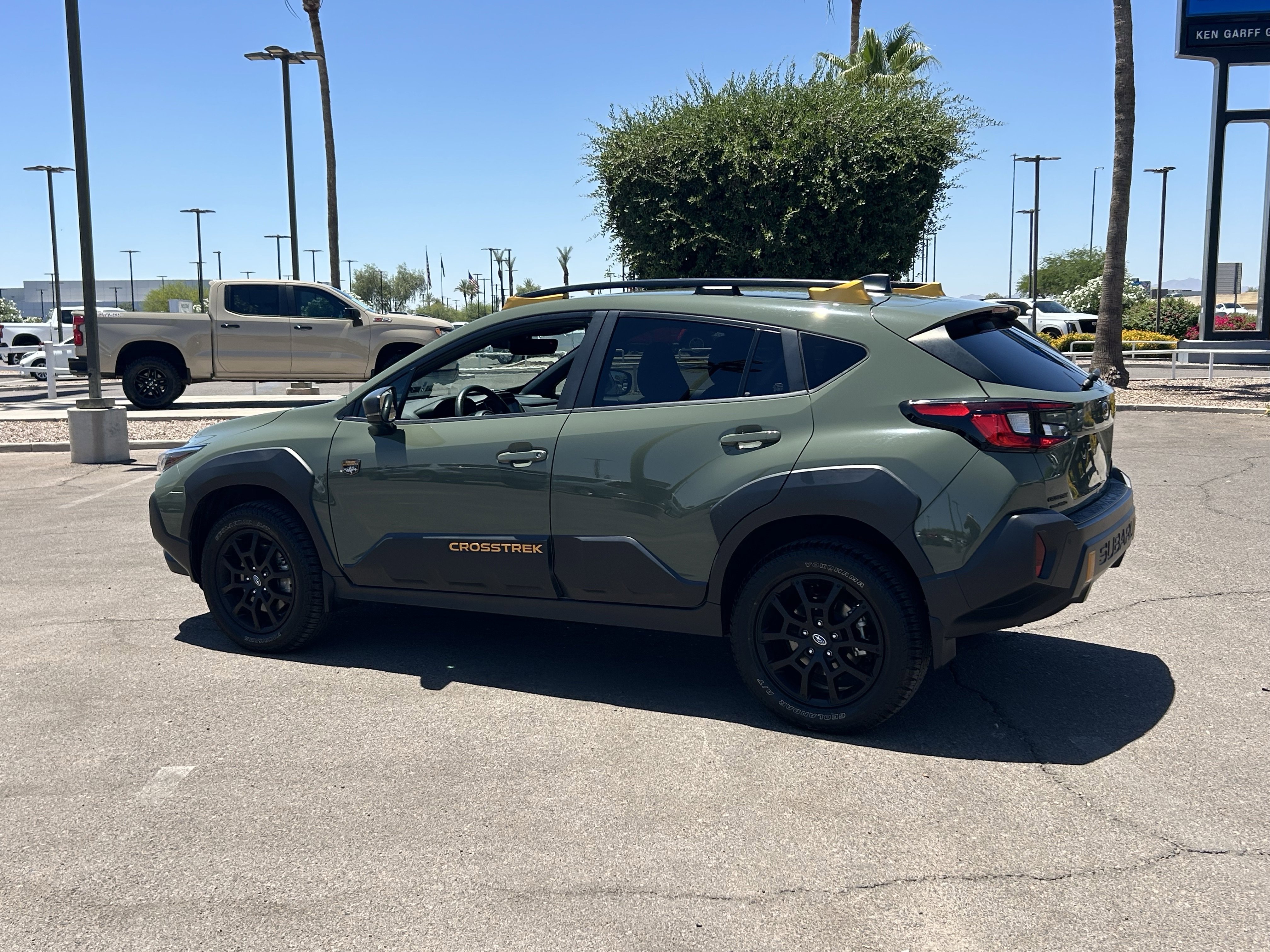 Used 2024 Alpine Green Subaru Wilderness image 3