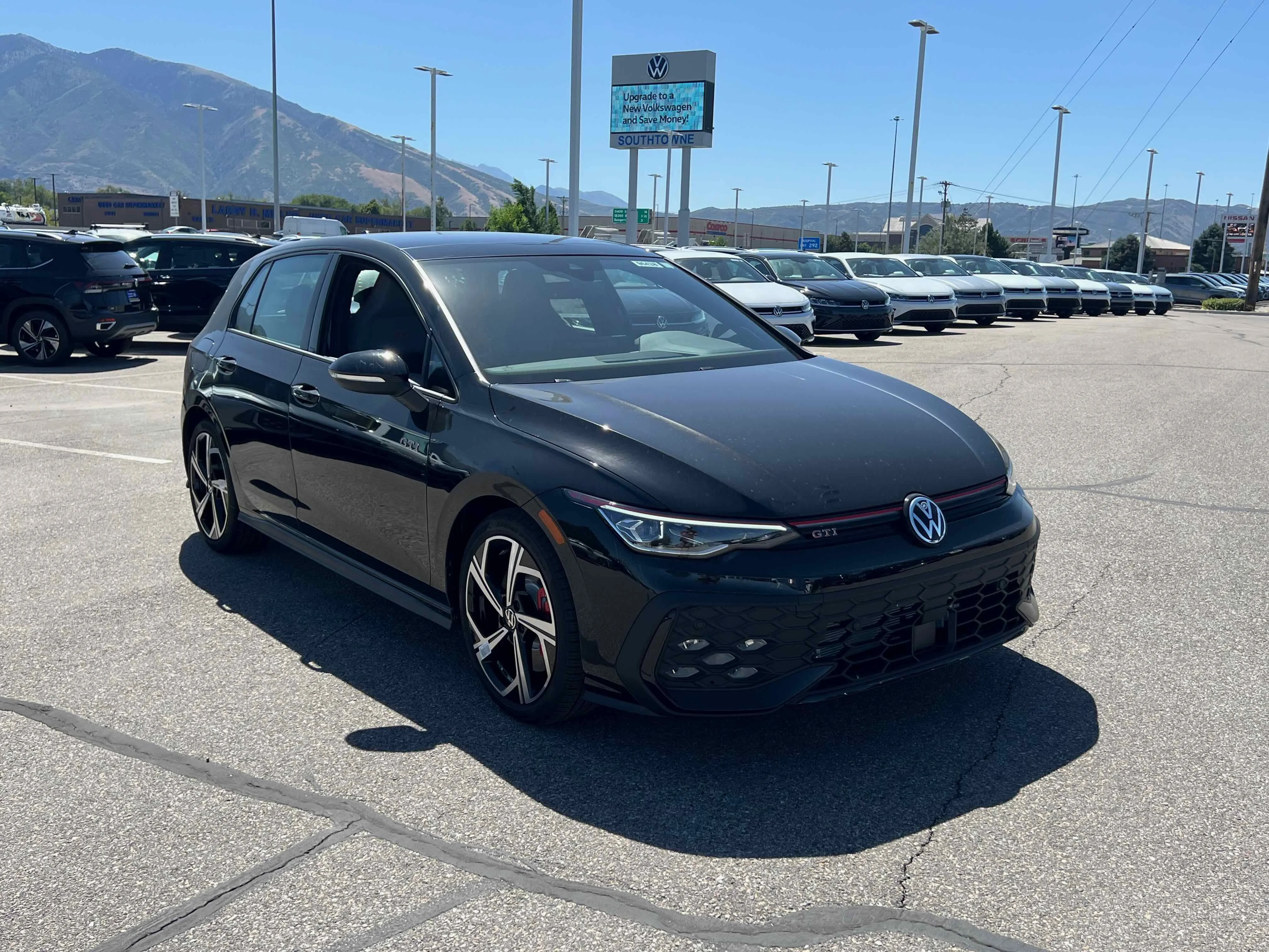 New 2025 Black Volkswagen SE image 8