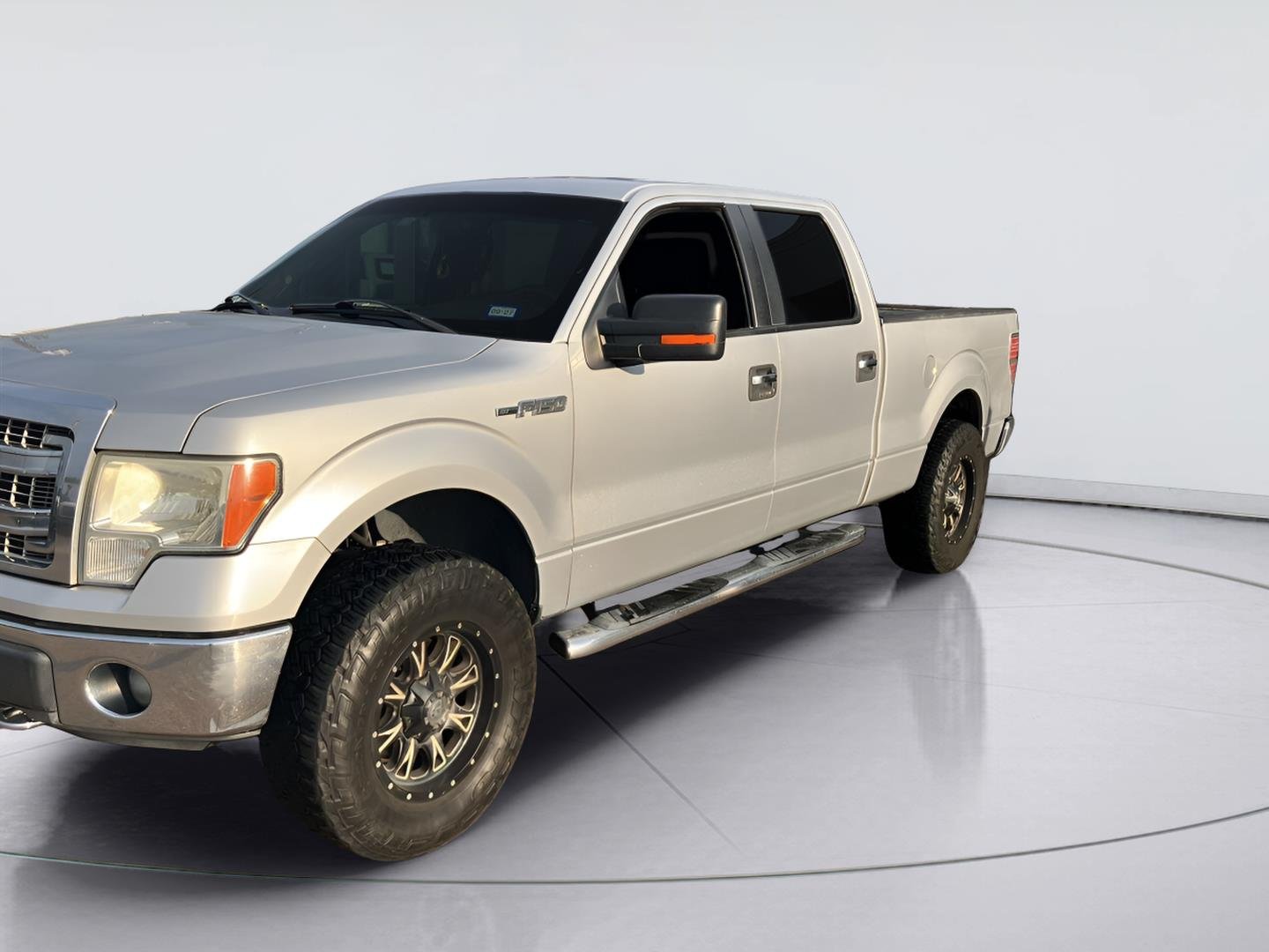 Used 2013 Ingot Silver Metallic Ford XLT image 1
