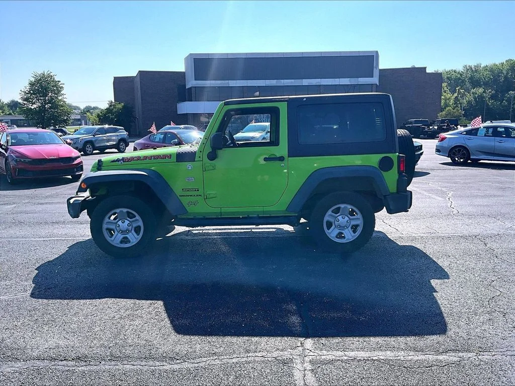 Used 2012 Beige Jeep Sport image 5