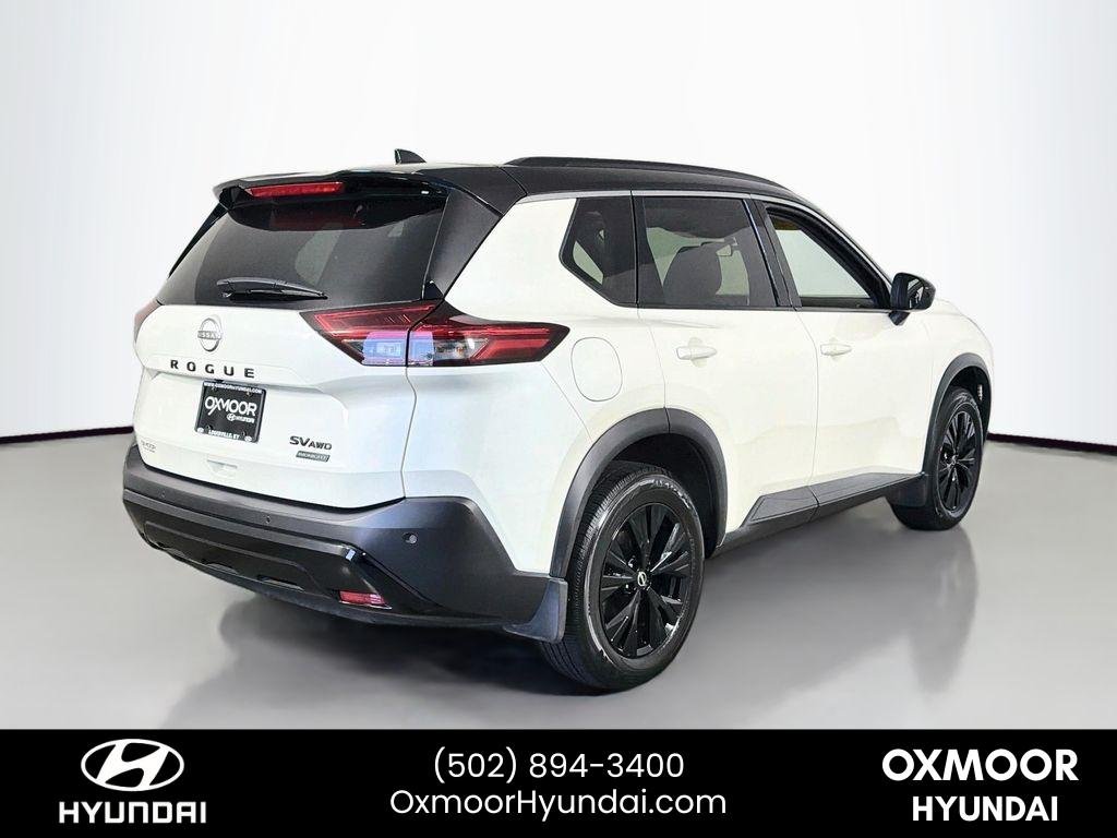 Used 2023 Pearl White Tricoat/Super Black Nissan SV image 7