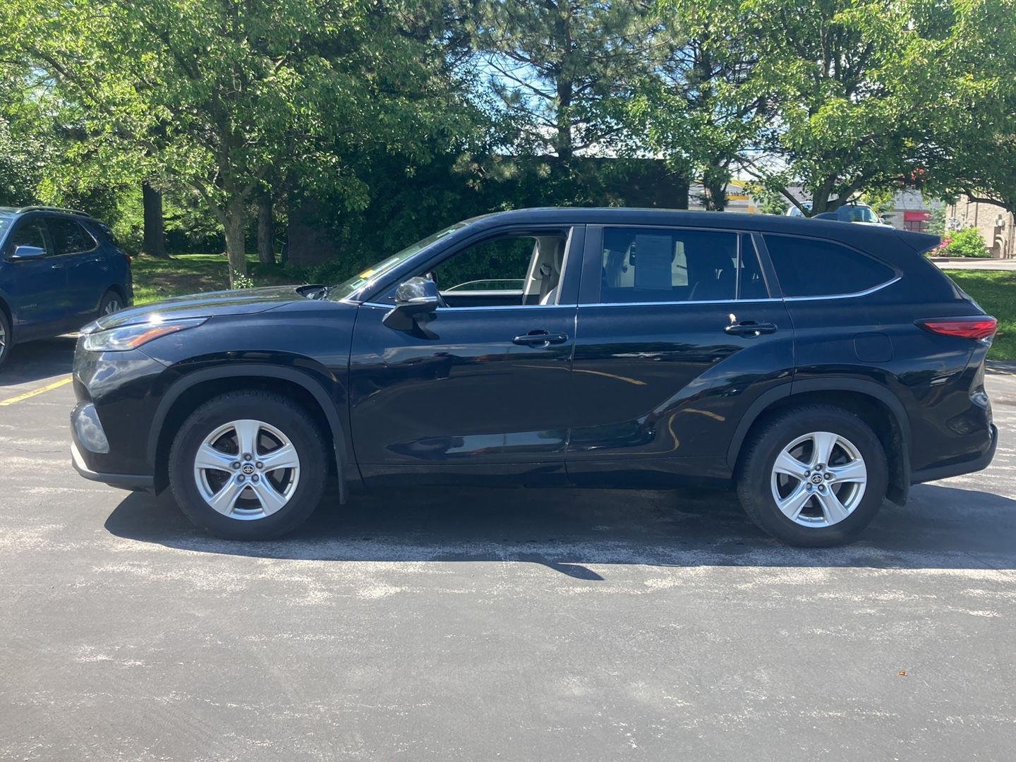 Used 2023 Midnight Black Metallic Toyota LE image 4