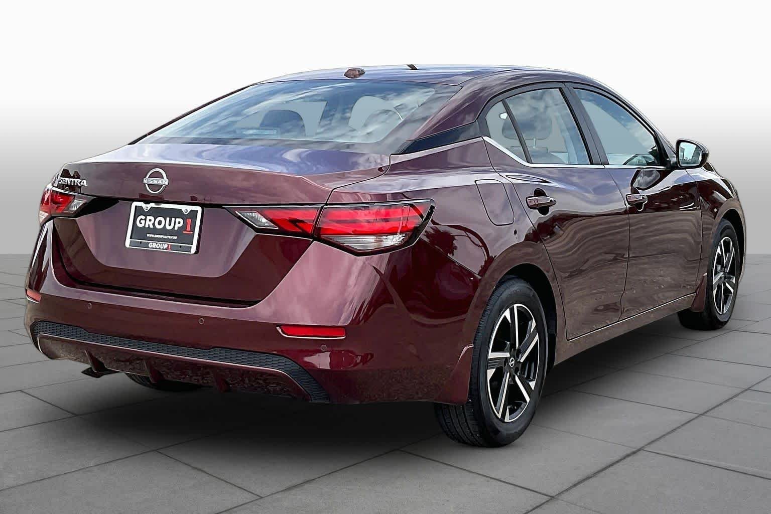 Used 2025 Rosewood Metallic Nissan SV image 12