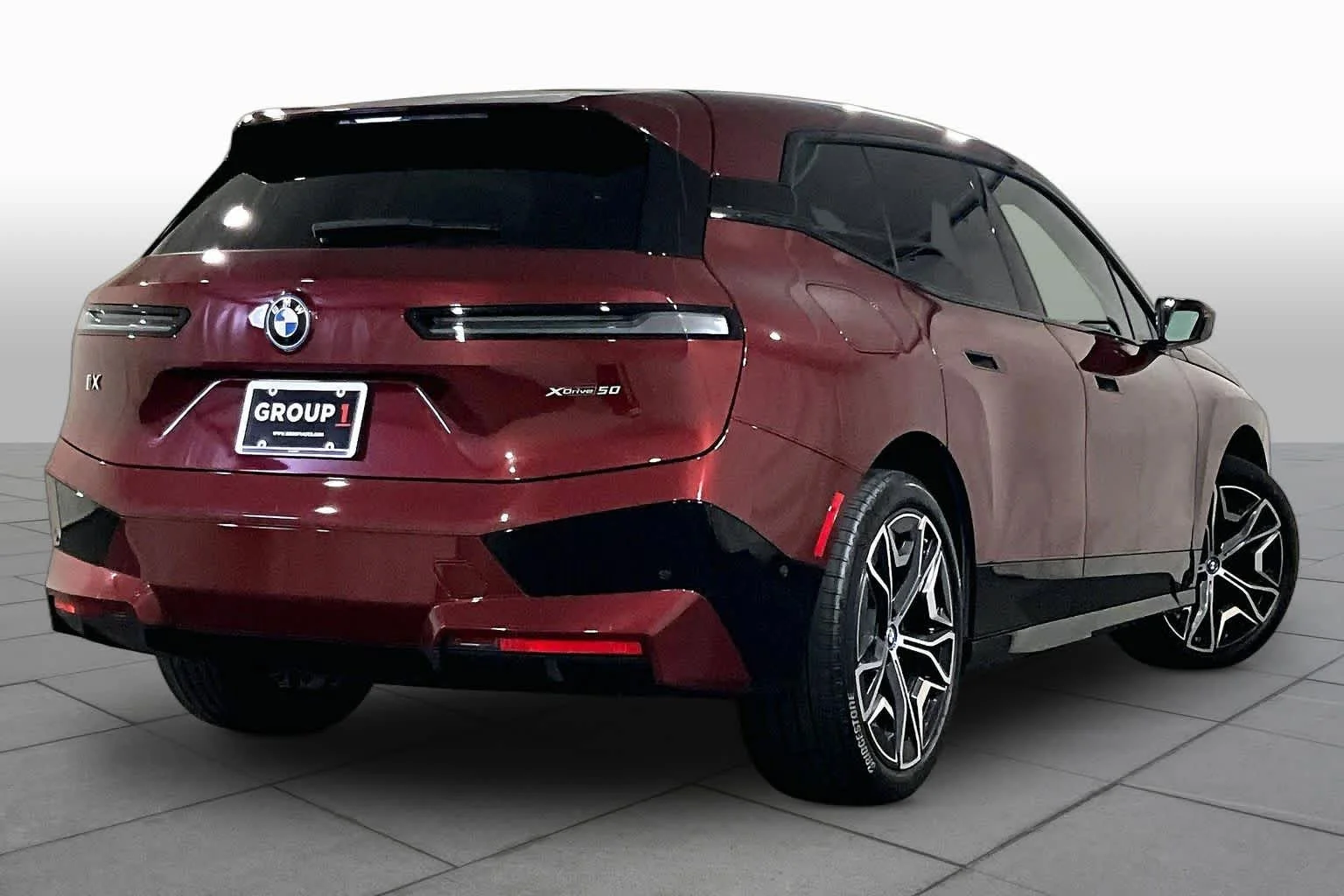 Used 2024 Aventurin Red Metallic BMW xDrive50 image 12