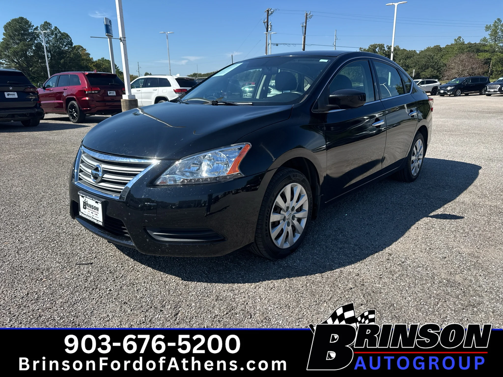 Used 2015 Super Black Nissan SV image 1