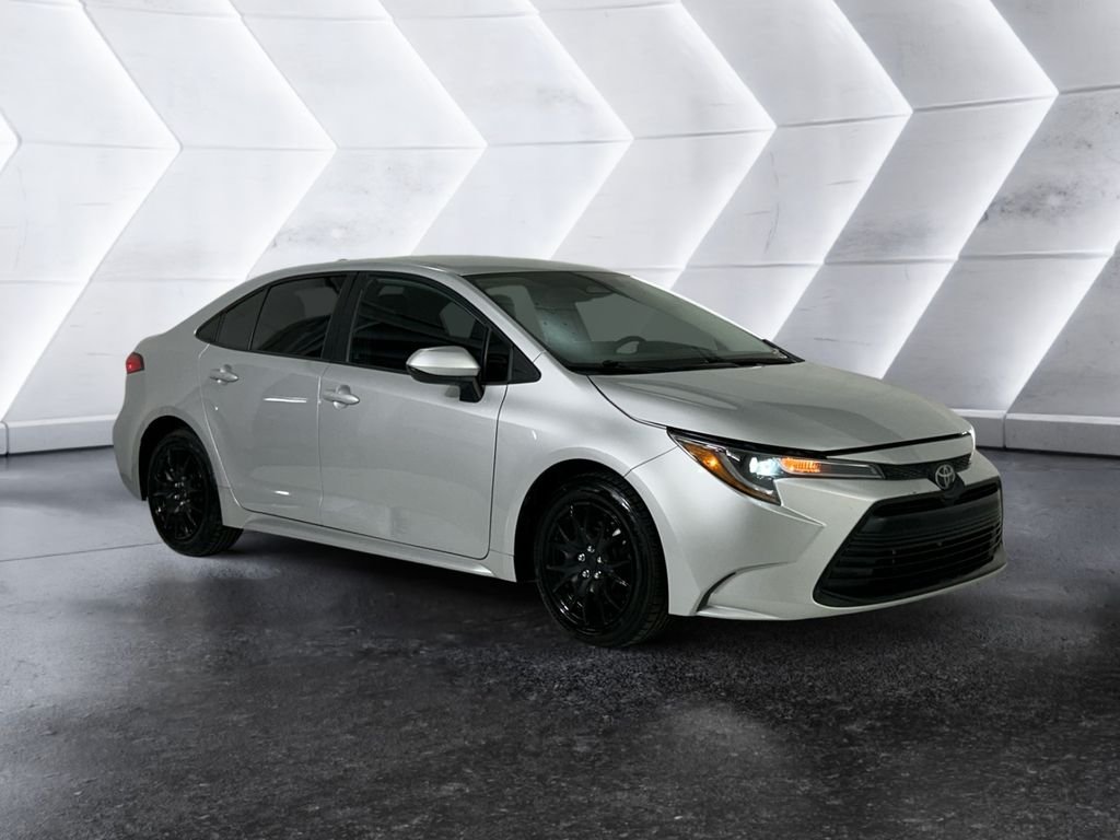 Used 2023 Silver Toyota LE image 1