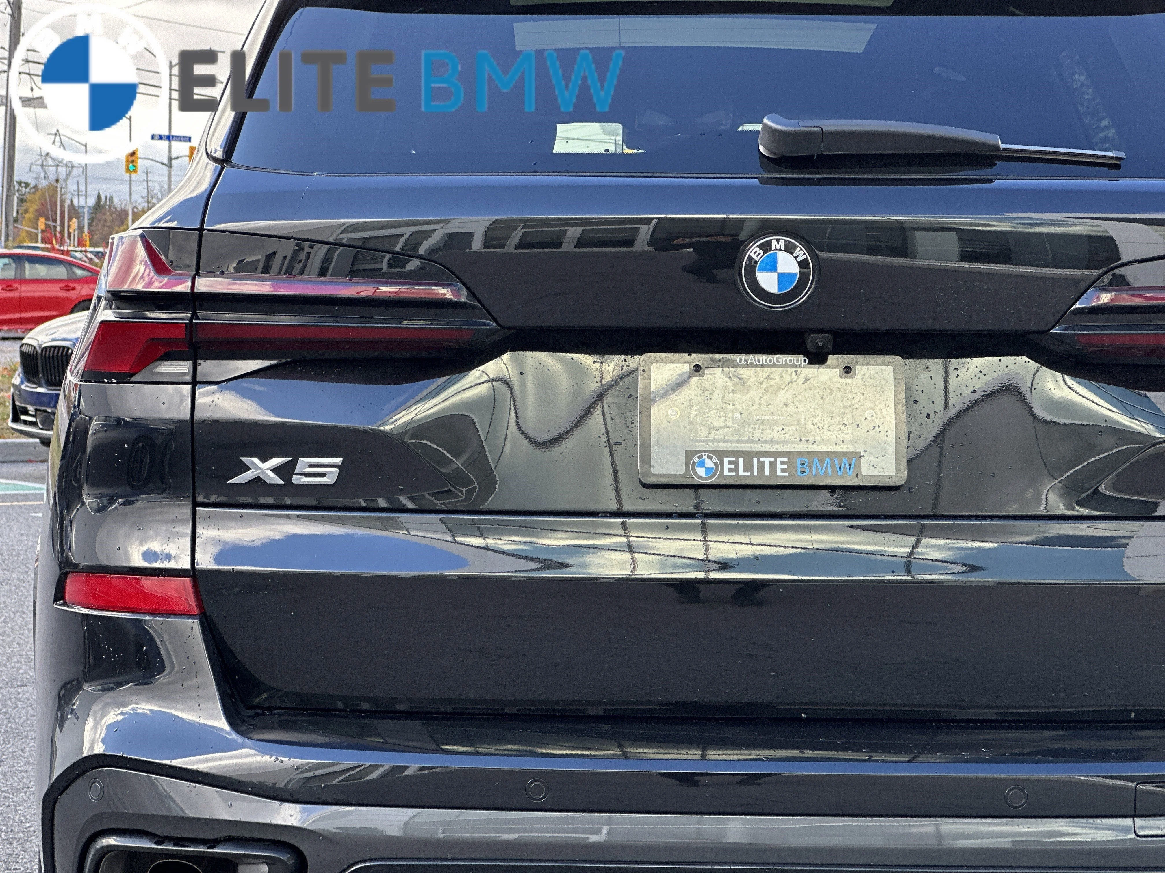 Used 2026 BLACK SAPPHIRE METALLIC BMW XDRIVE40I image 34