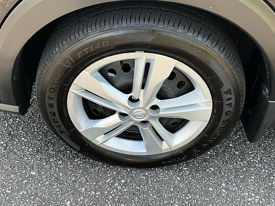 Certified Used 2025 Super Black Nissan S image 9
