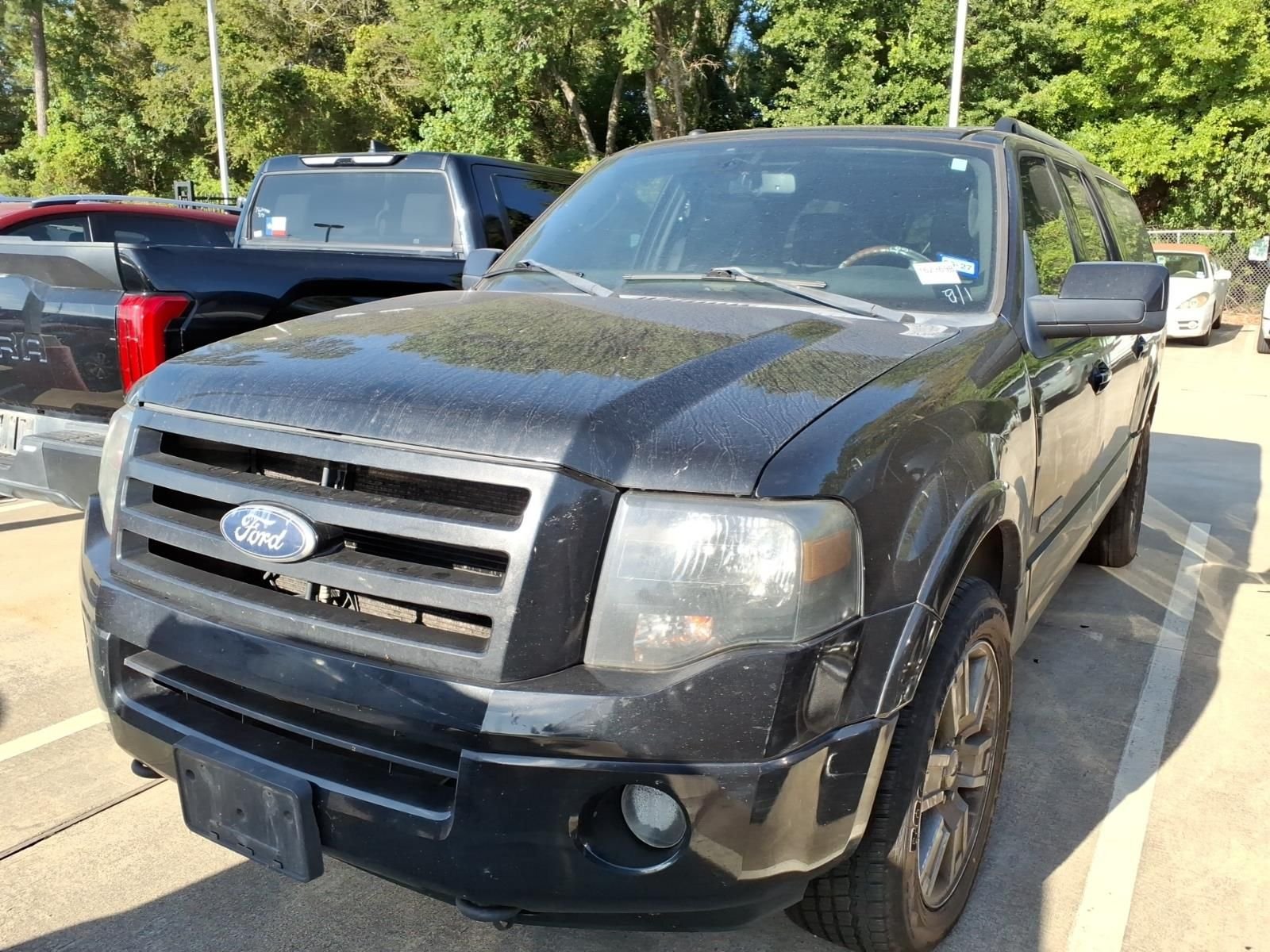 Used 2010 Tuxedo Black Metallic Ford Limited image 4