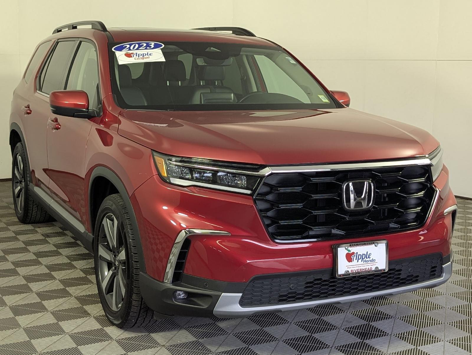 Certified Used 2023 Radiant Red Metallic II Honda AWD TRG image 1