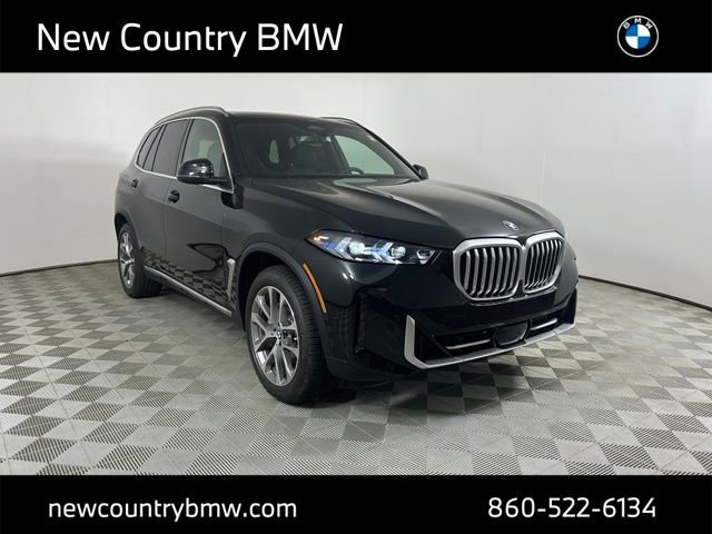 New 2026 Black Sapphire Metallic BMW xDrive40i image 1