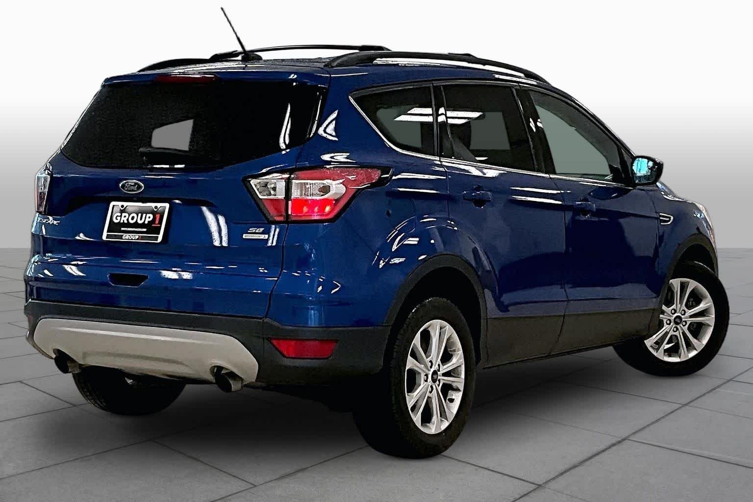 Used 2018 Lightning Blue Metallic Ford SE image 12