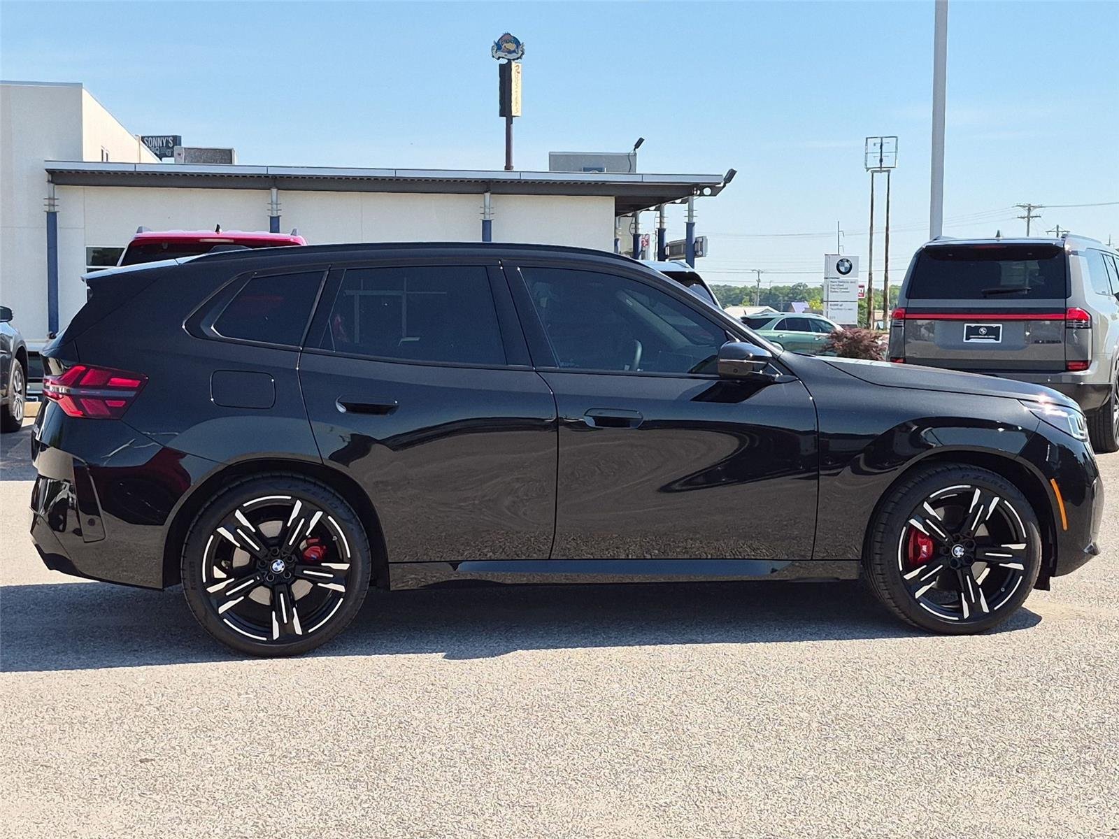 Used 2026 Black Sapphire Metallic BMW M50 xDrive image 6