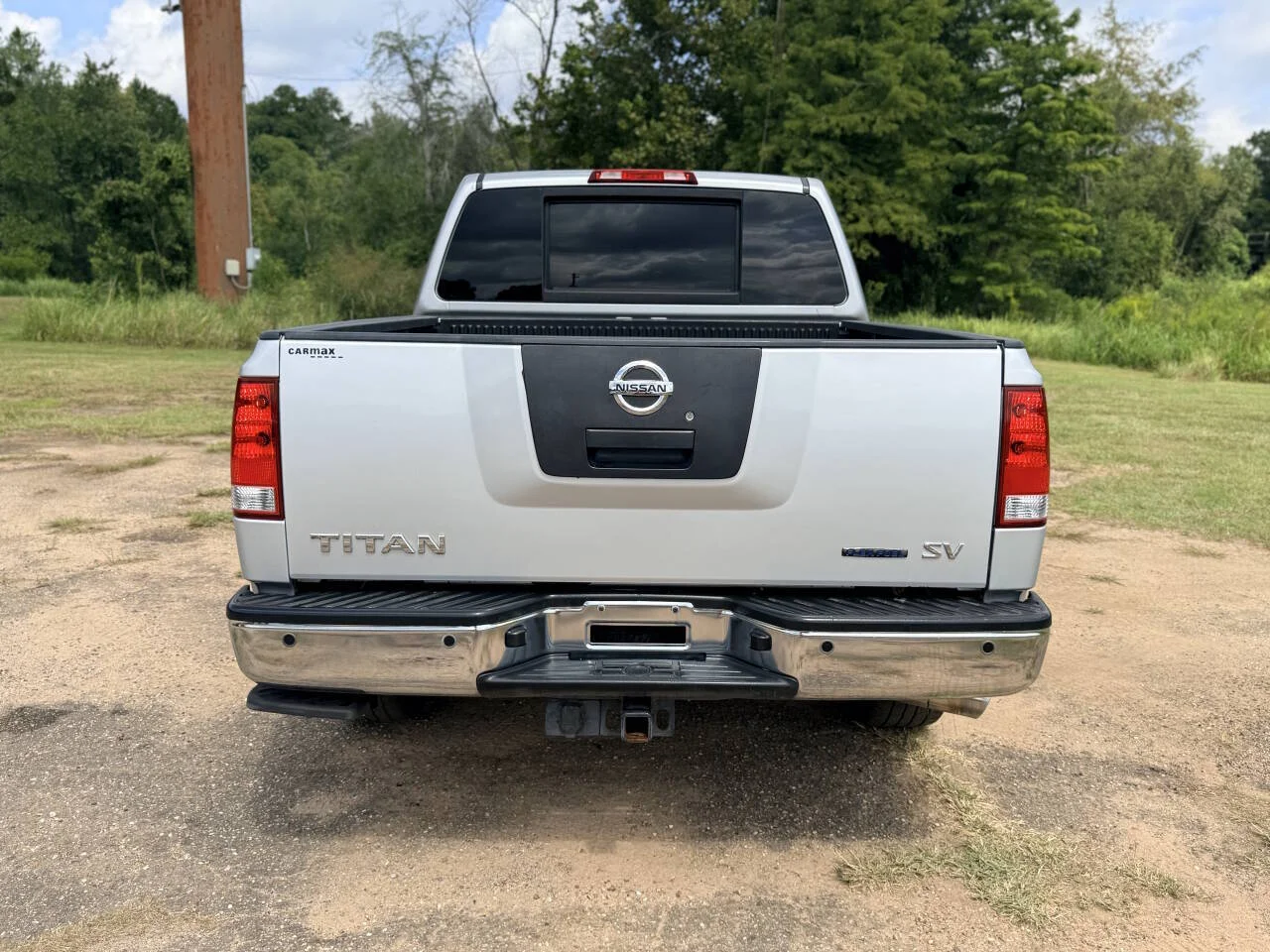 Used 2012 Silver Nissan SV 4x2 4dr Crew Cab SWB Pickup image 4