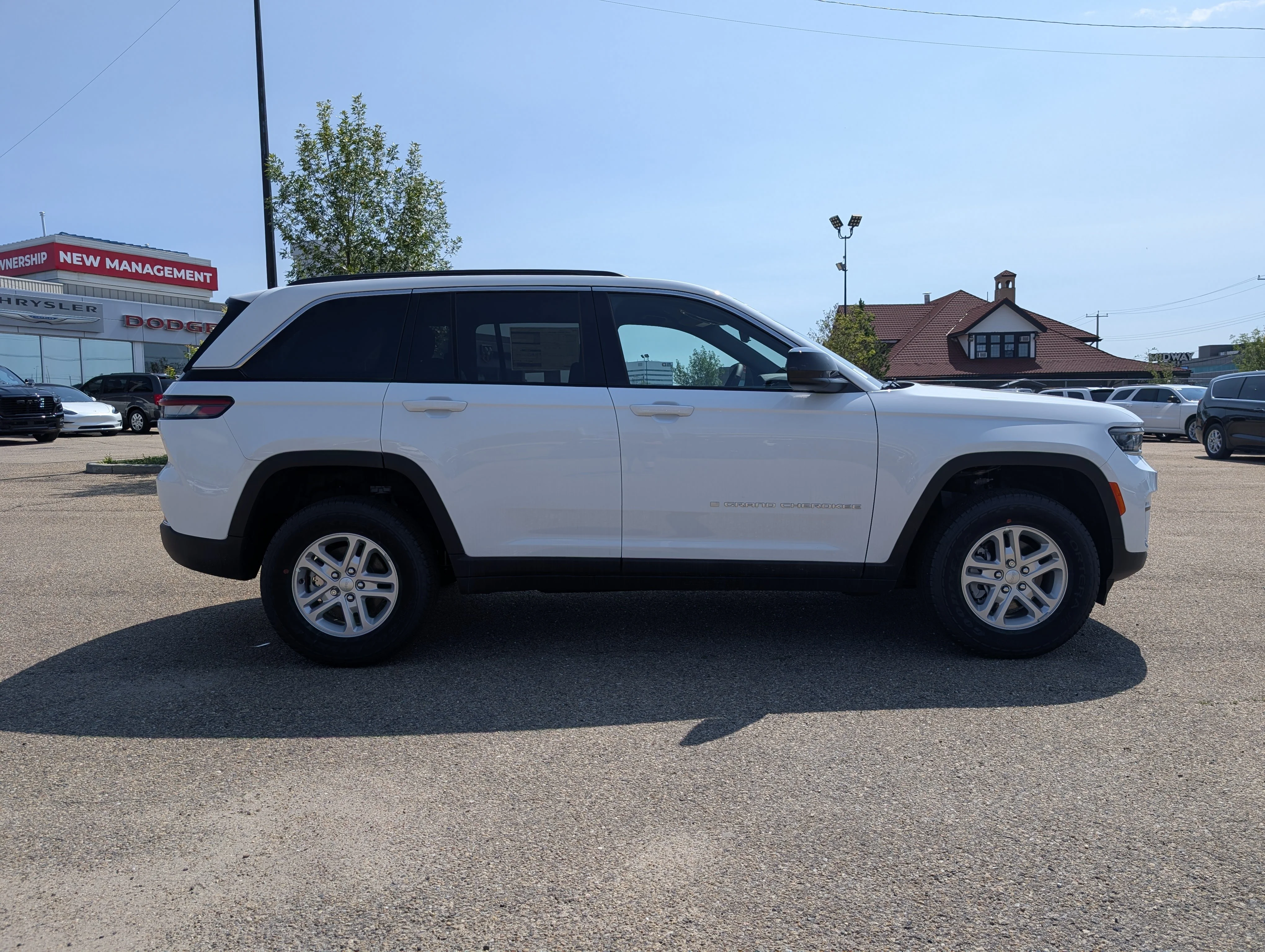 New 2025 Bright White Jeep Laredo image 8