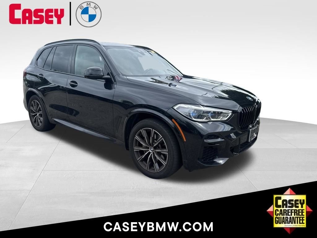 Used 2022 Black BMW sDrive40i image 1