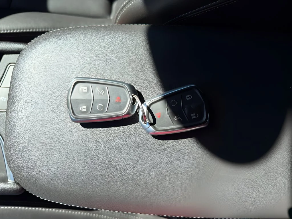 Used 2024 Argent Silver Metallic Cadillac Sport image 2