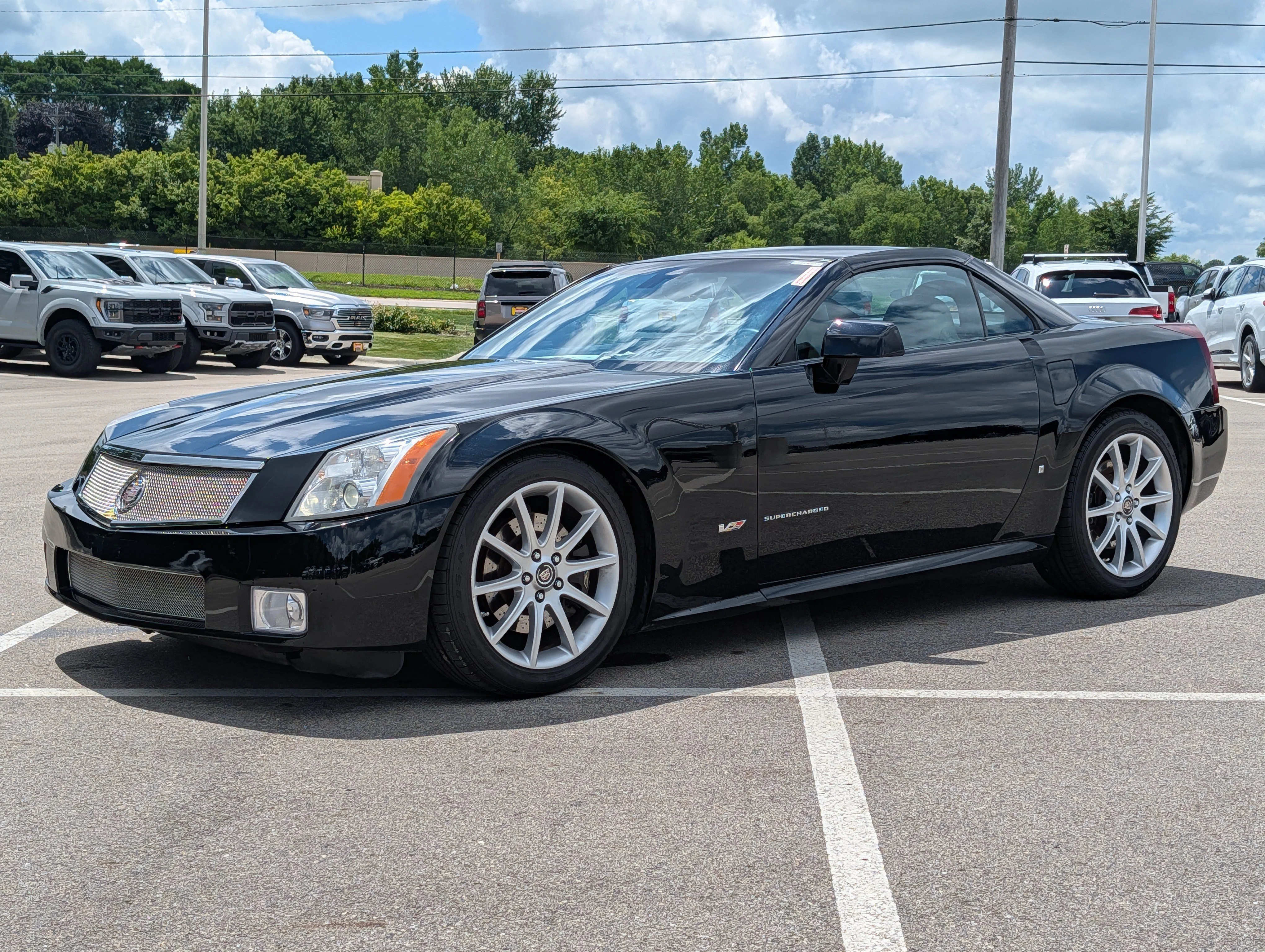 Used 2006 Black Raven Cadillac  image 28