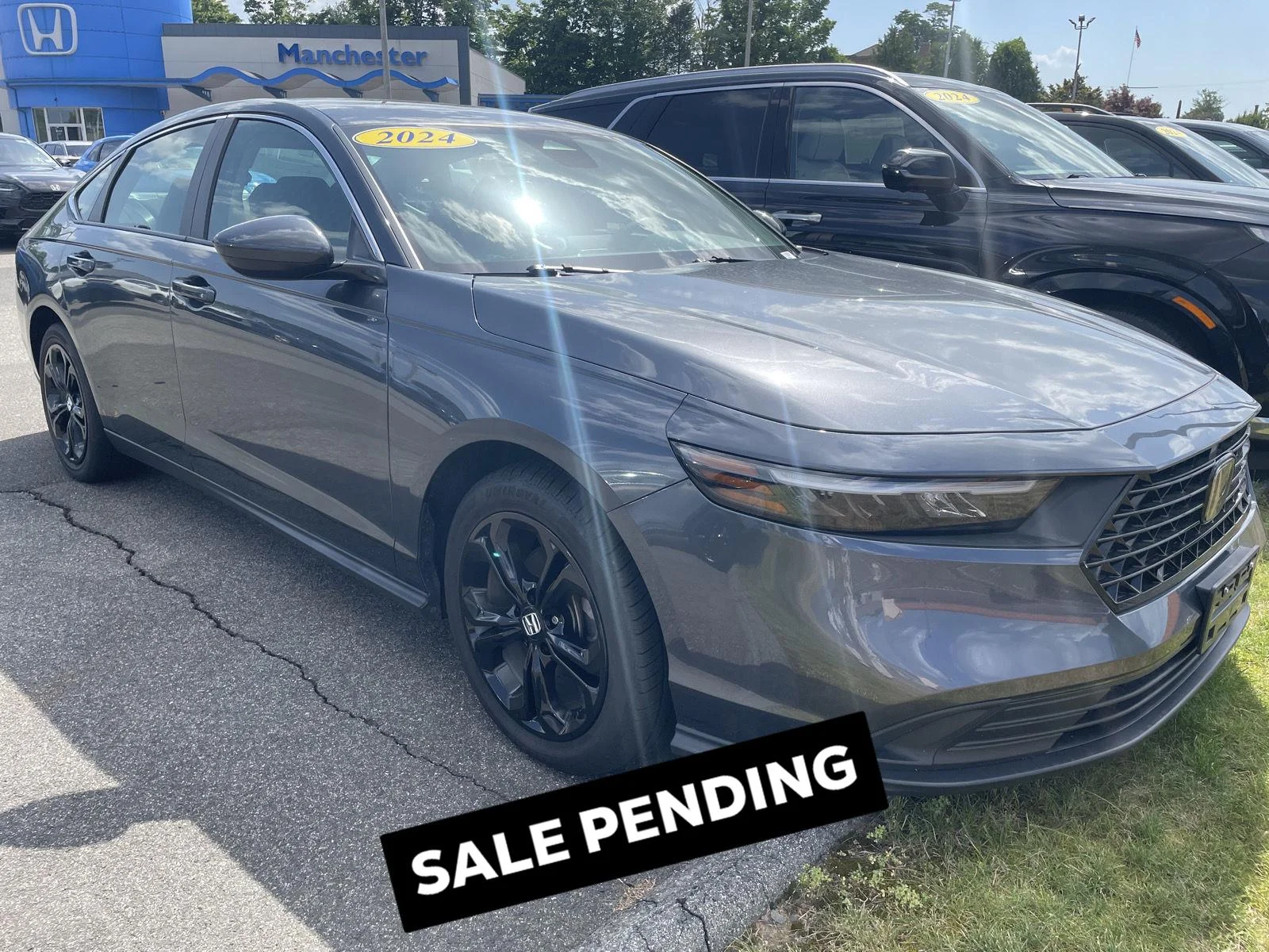 Used 2024 Meteorite Gray Metallic Honda LX image 1