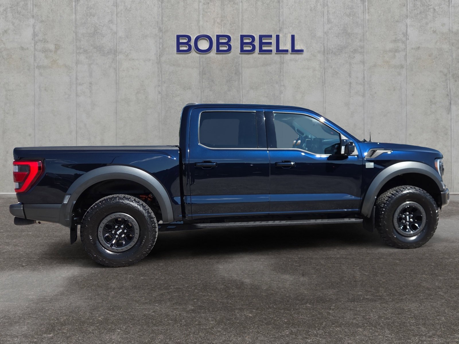Used 2023 Blue Metallic Ford Raptor image 6