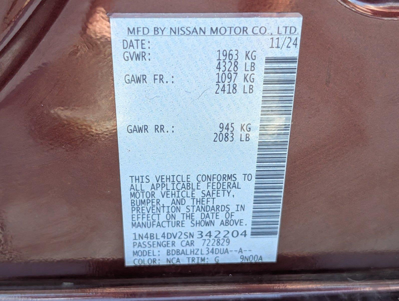 Used 2025 Garnet Pearl Metallic Nissan SV image 35