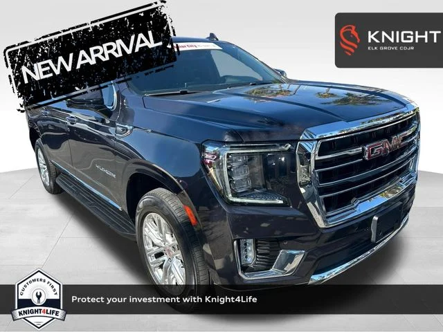 Used 2023 Titanium GMC SLT image 1