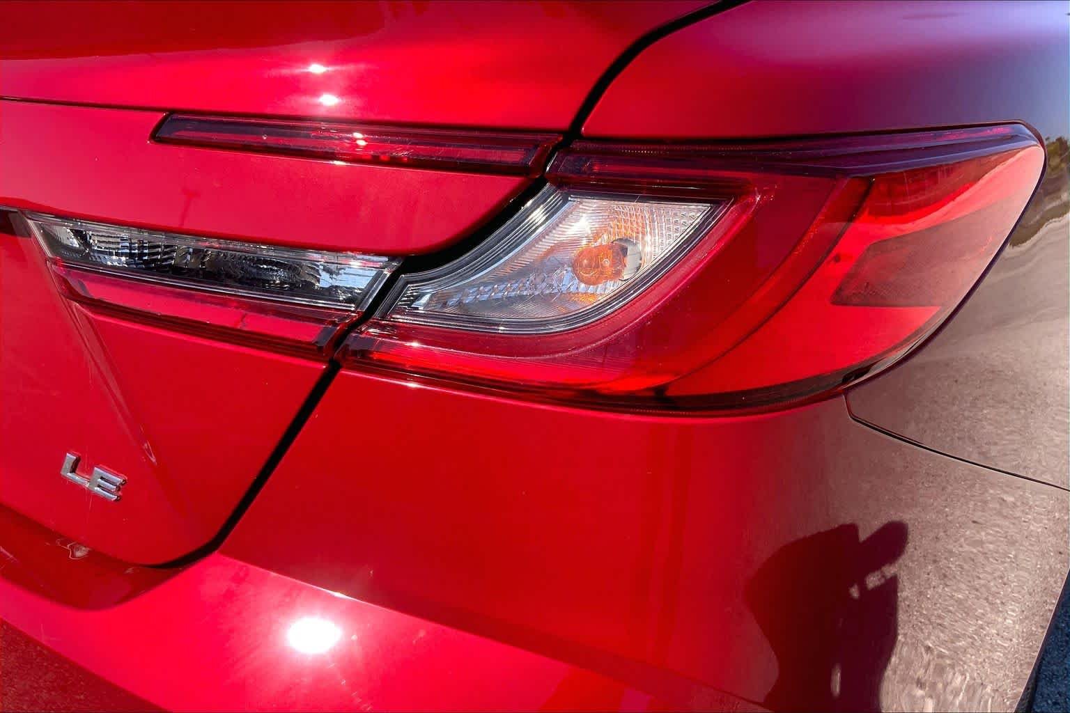 Used 2025 Supersonic Red Toyota LE image 30