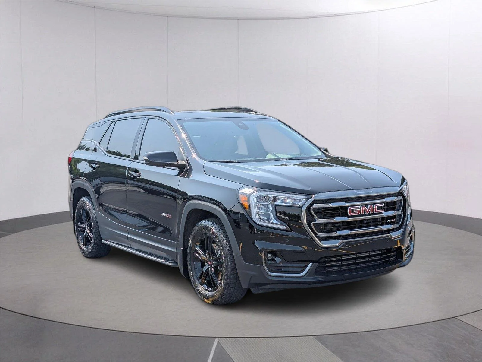 Used 2023 EBONY TWILIGHT METALLIC GMC AT4 image 7