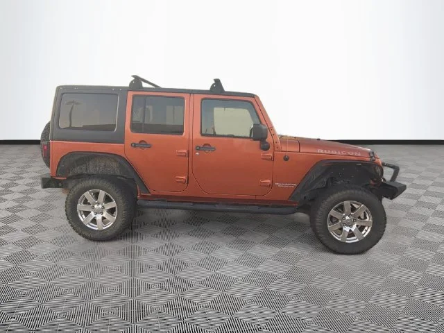 Used 2011 Orange Jeep Unlimited Rubicon image 5