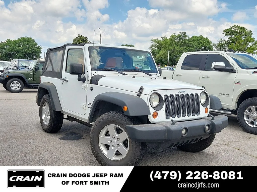 Used 2012 White Jeep Sport image 1