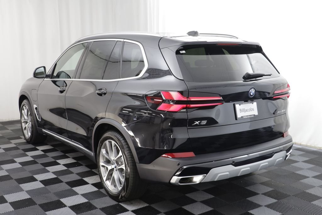 New 2026 Black Sapphire Metallic BMW xDrive50e image 18