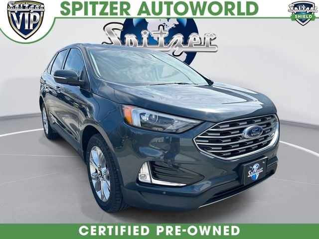 Used 2024 Blue Ford Titanium image 1