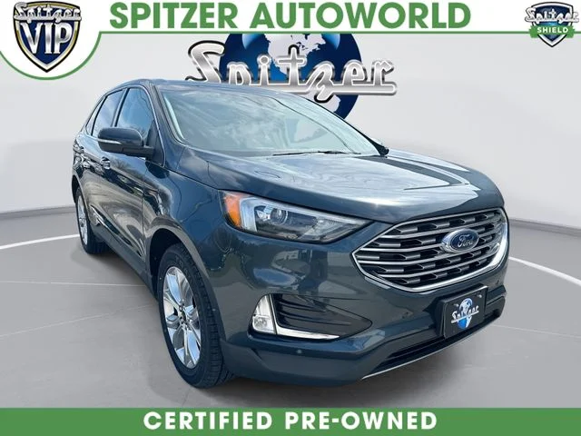 Certified Used 2024 Blue Ford Titanium image 1