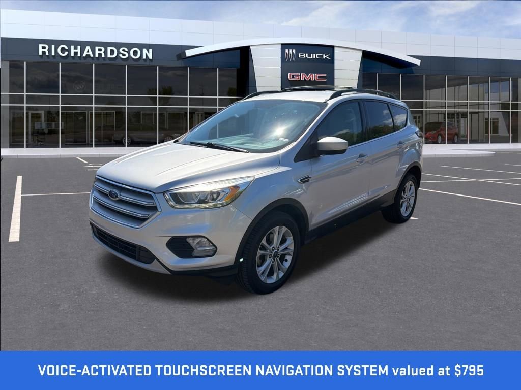 Used 2018 Ford Escape SEL with VIN 1FMCU0HD5JUA53811 for sale in Midland, MI