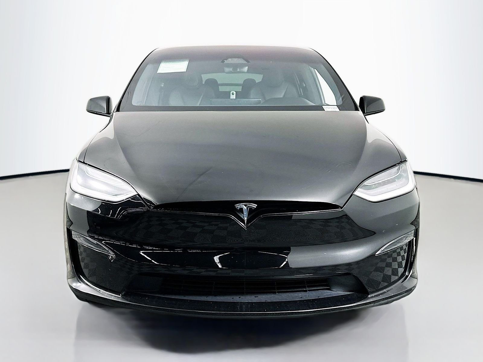 Used 2023 Solid Black Tesla Plaid image 2