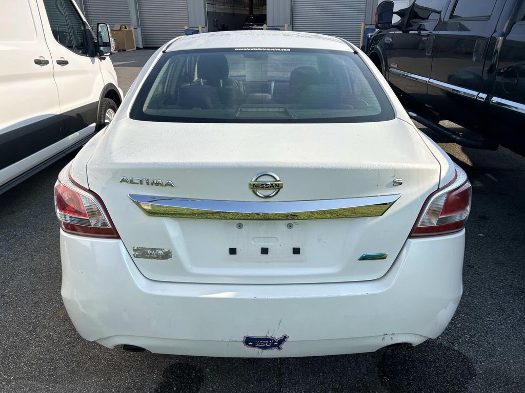 Used 2013 Pearl White Metallic Nissan 2.5 S image 4