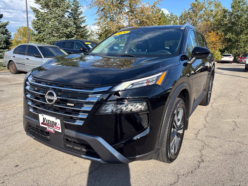 Used 2024 Black Nissan SL image 1