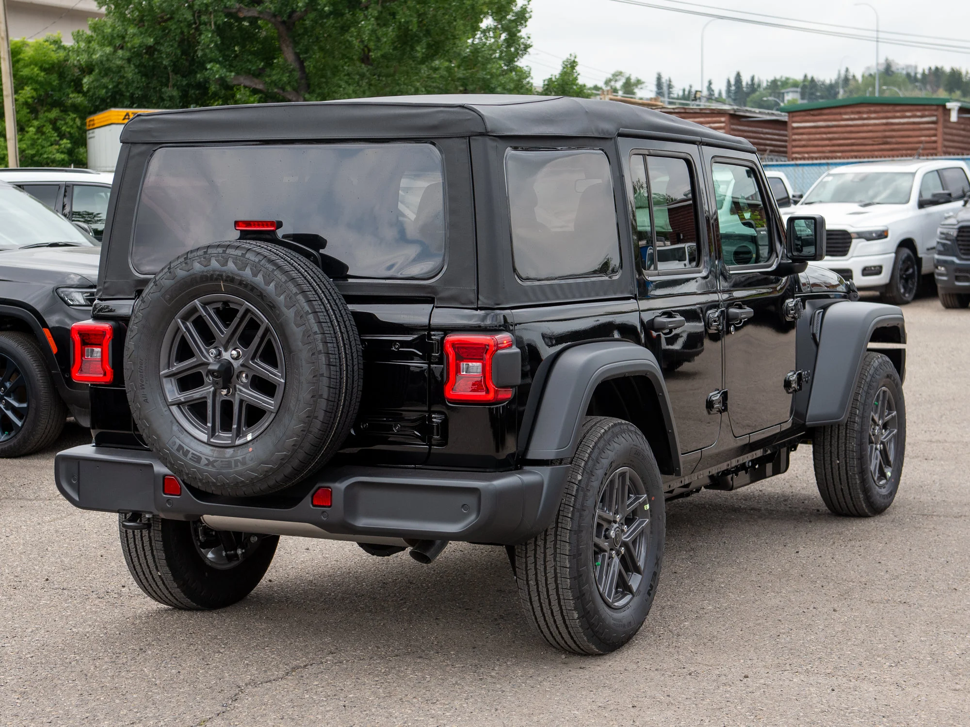New 2026 Black Jeep Sport S* image 5