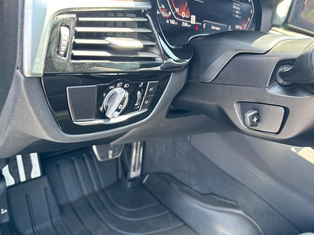 Used 2023 Black Sapphire Metallic BMW M550i xDrive image 17