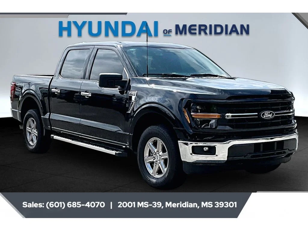 Used 2025 Agate Black Metallic Ford XLT image 1