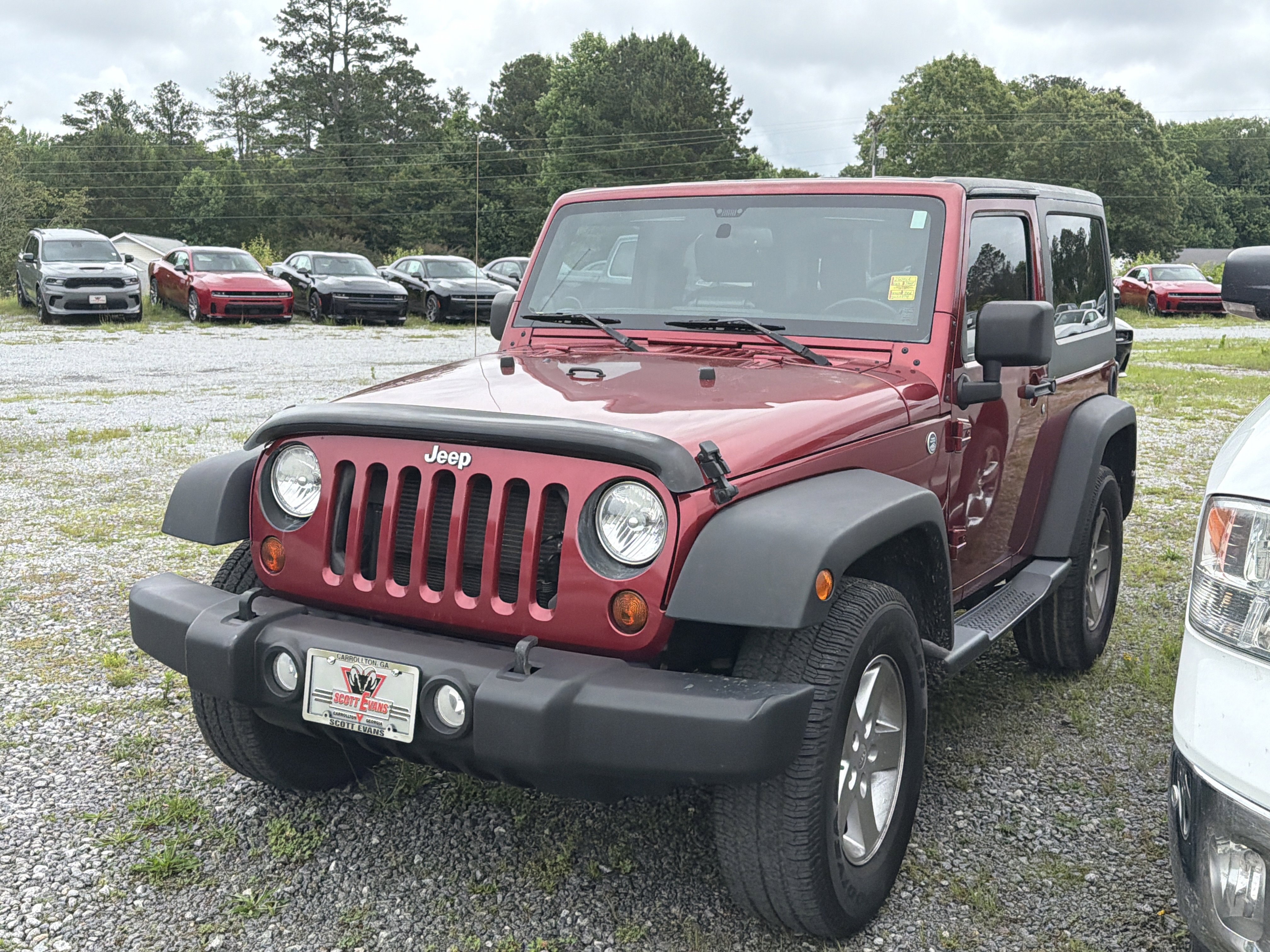 Used 2013 Deep Cherry Red Crystal Pearl Jeep Sport image 3
