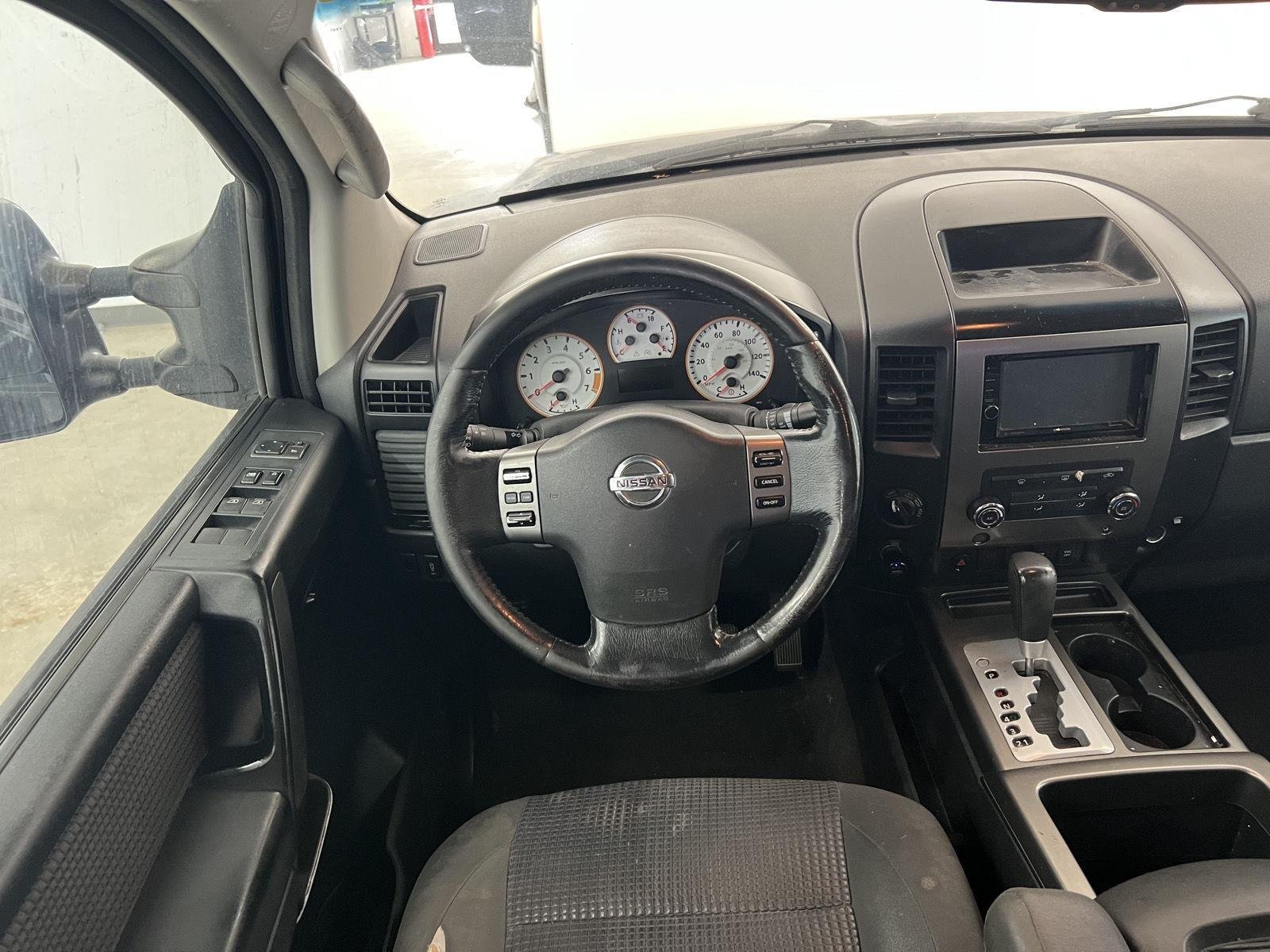Used 2011 Nissan Titan SV with VIN 1N6AA0EC3BN307136 for sale in Logan, UT