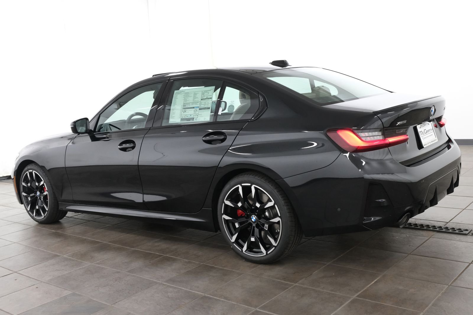 New 2026 Black Sapphire Metallic BMW 330i xDrive image 3