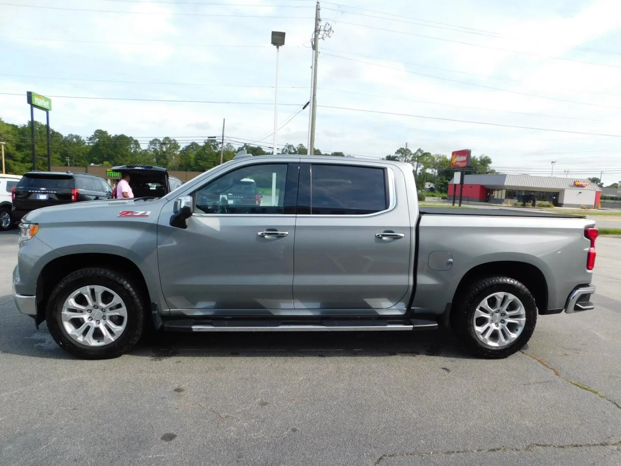 Used 2023 Silver Chevrolet 4WD CREW CAB 147 in LTZ image 5