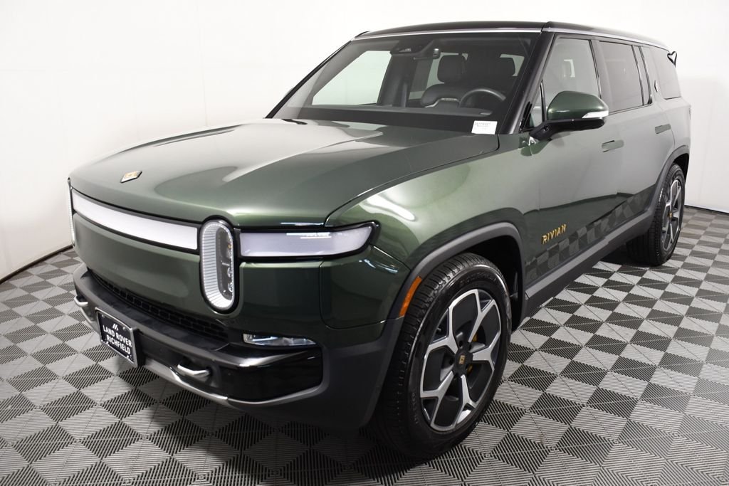 Used 2023 Forest Green Rivian Adventure image 1